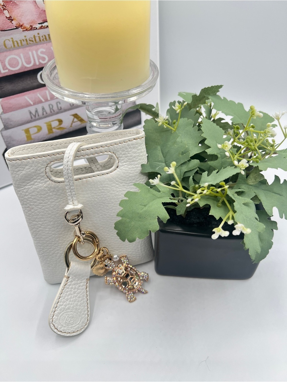 Dooney and Bourke White Leather Pouch with Key Ring and Crystal Charm